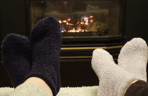 Best fuzzy socks in front of a fireplace