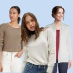 Three women wearing the best lightweight women's sweaters